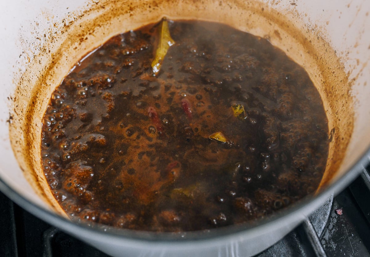 reducing ayam kecap sauce