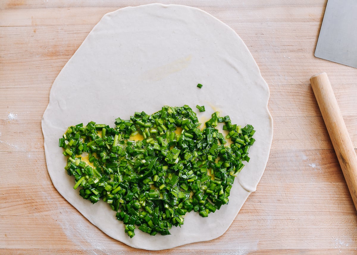 chive egg mixture spread onto pancake