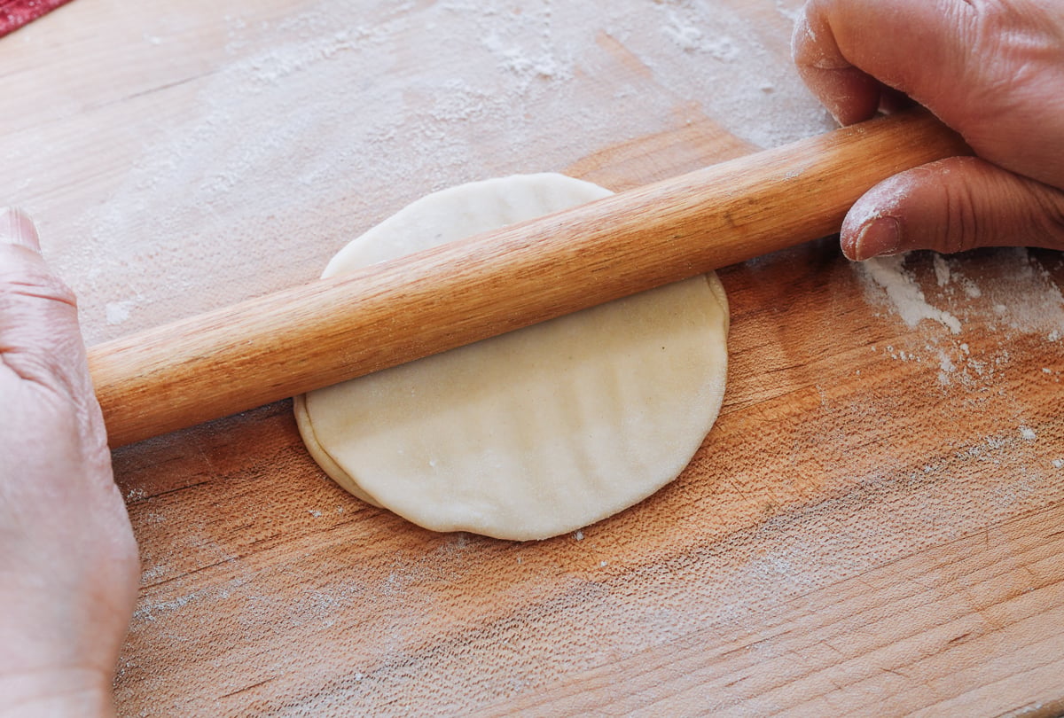 rolling dough for mooshu pancakes