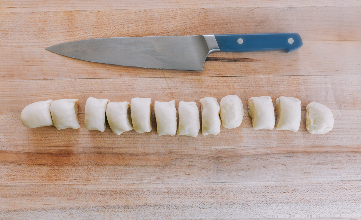 12 cut pieces of dough