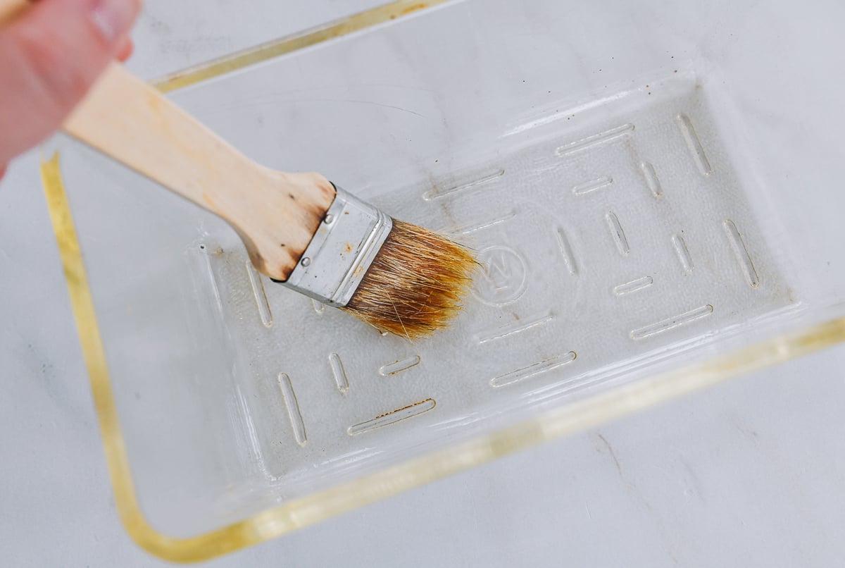 brushing loaf pan with oil