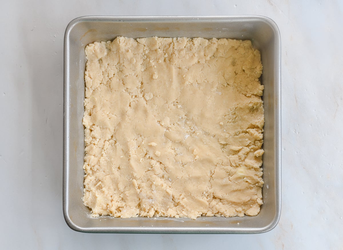 shortbread dough pressed into 9x9 inch square pan
