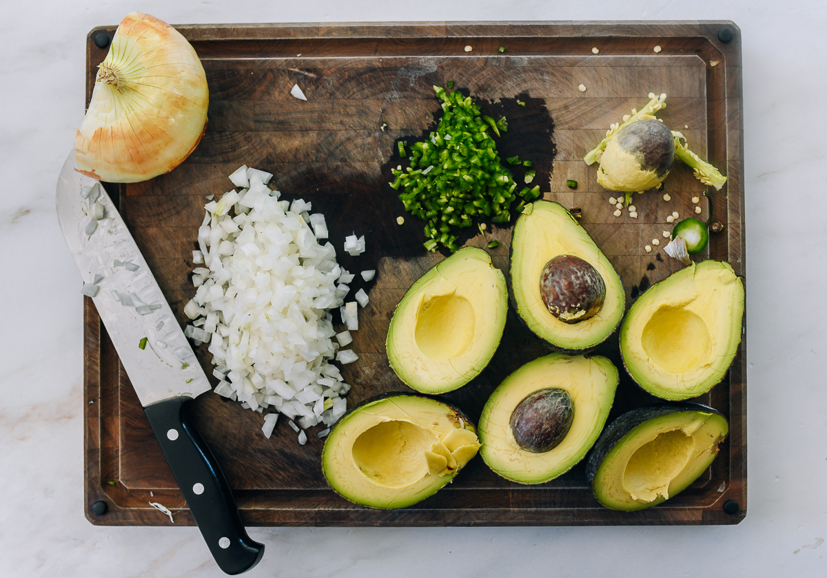 preparing guacamole recipe