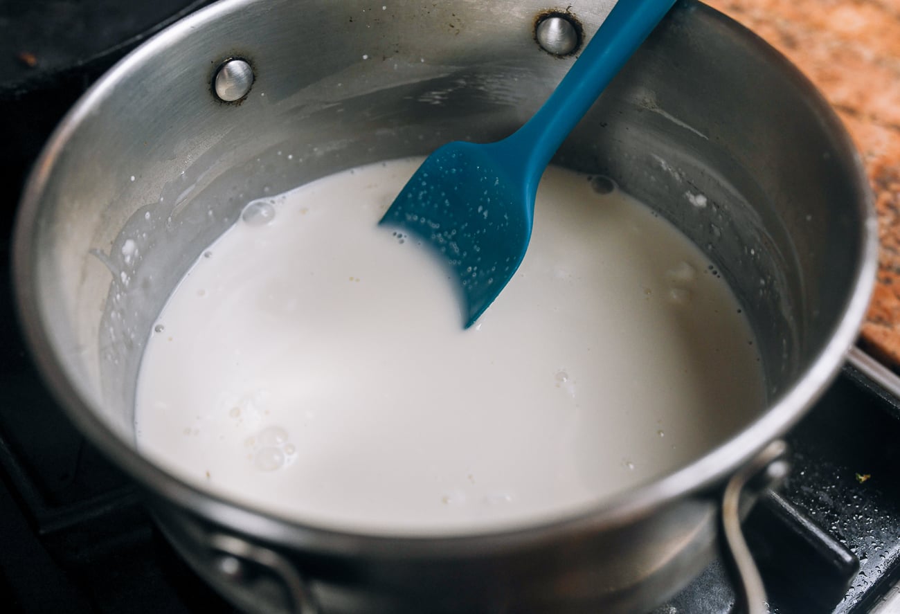 cooking milk and cornstarch in pot